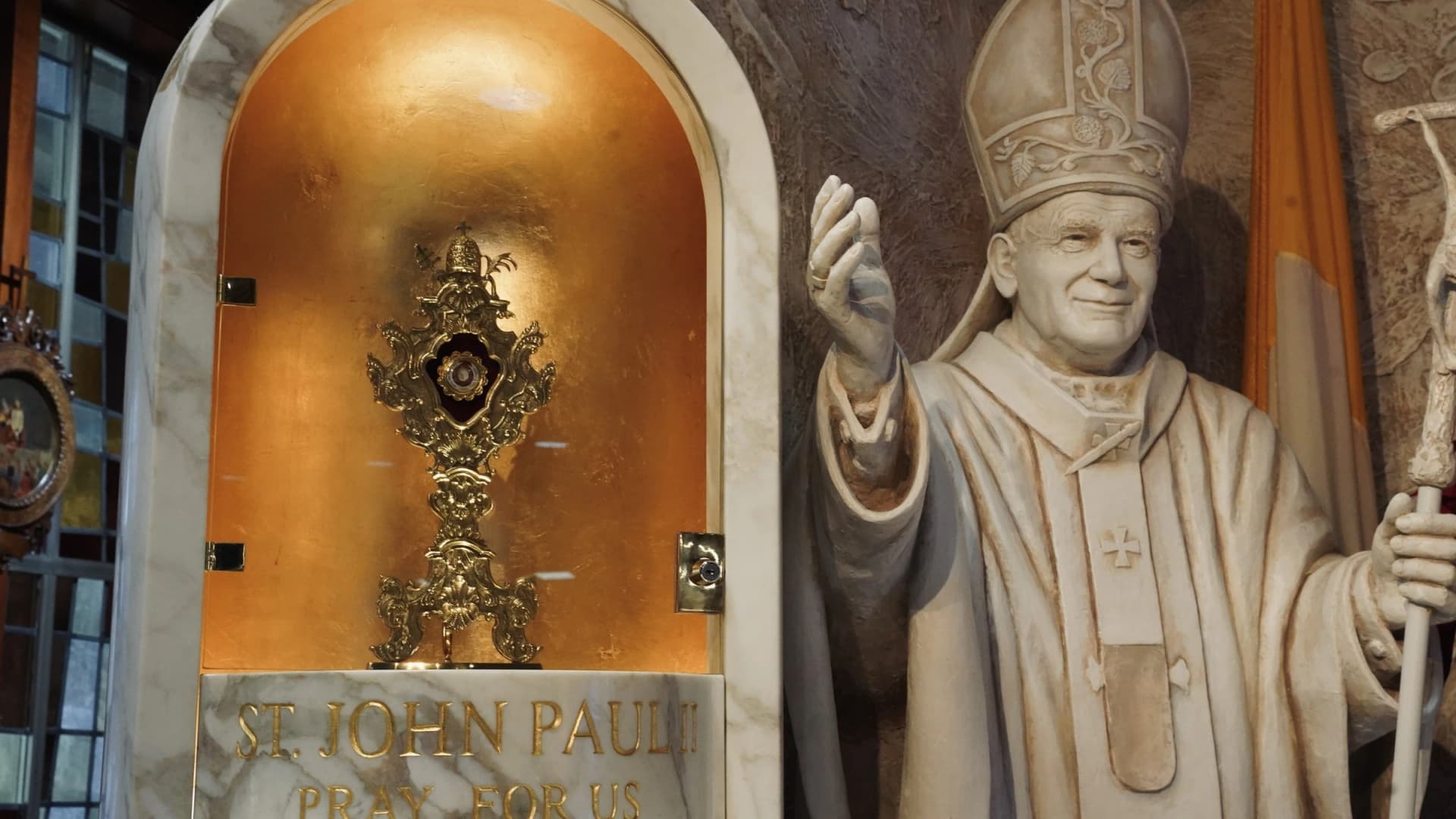 The reliquary and statue of Saint John Paul II in the Shrine at Orchard Lake