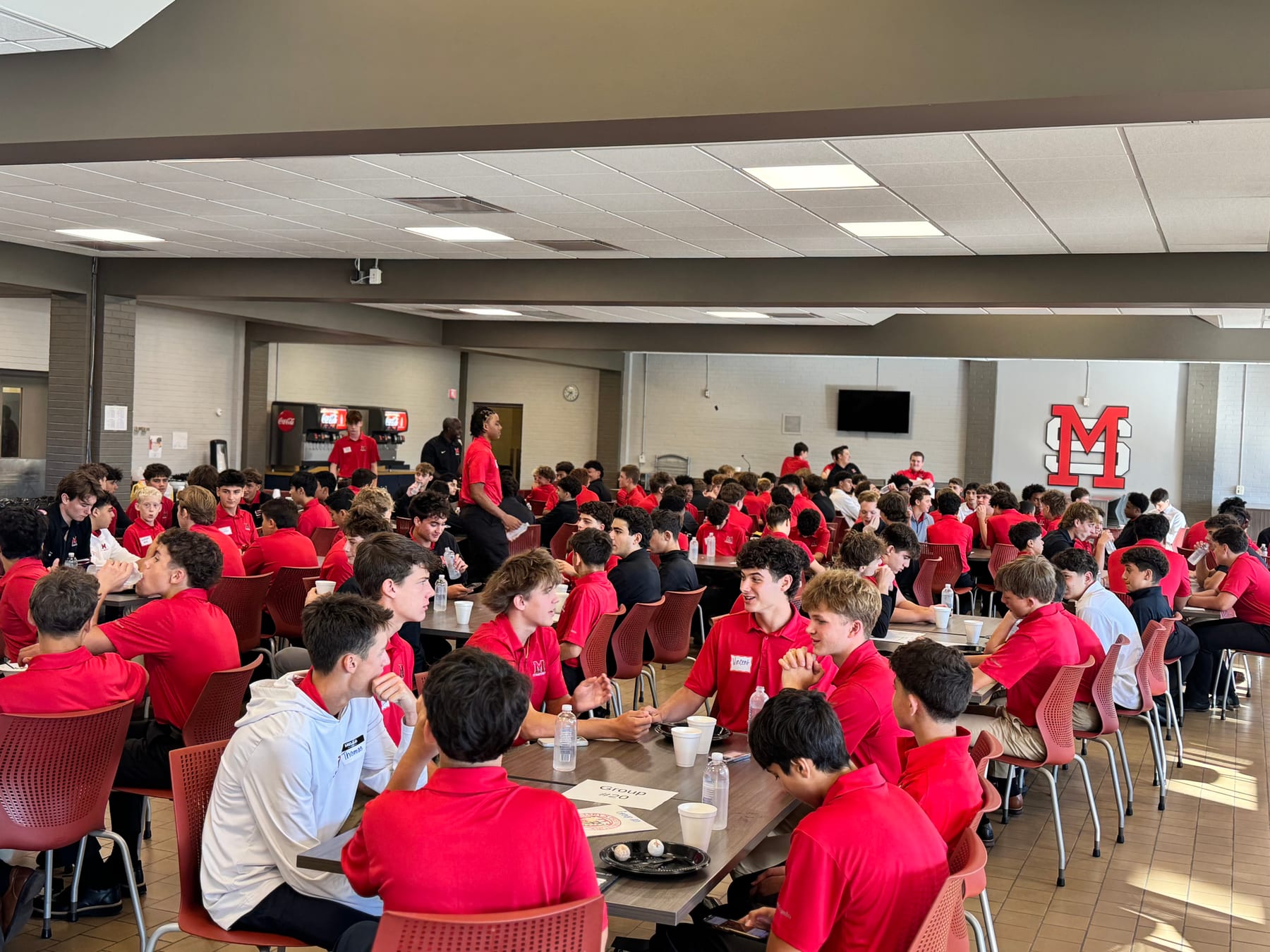Students talking together over lunch in the St. Mary’s dining hall