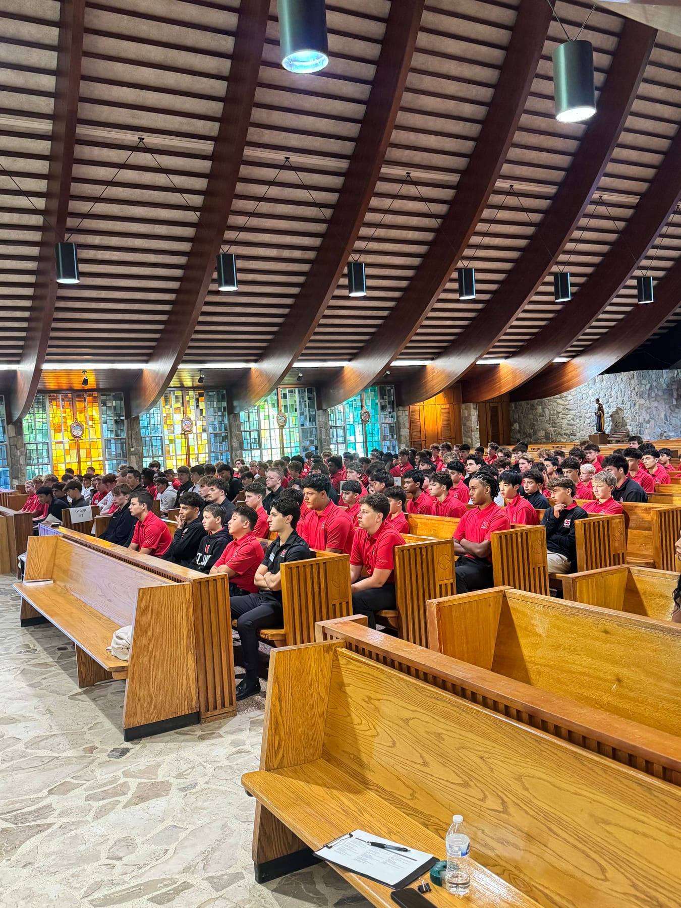 St. Mary’s students seated together inside the Shrine Chapel